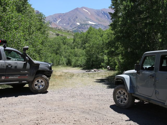 Tacoma and Jeep Rubicon in the mountains