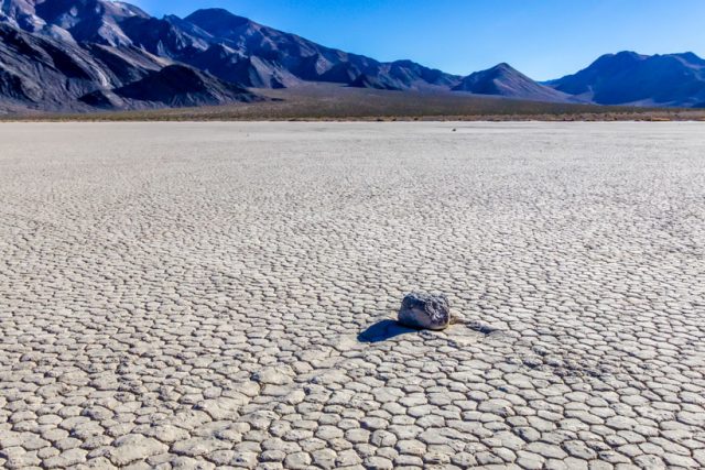 Moving rock on The Racetrack Playa Death Valley, Racetrack Road, overlanding, overland, over land, death valley national park, off-road trails, overland trails, californian overland trails, off-road, off road, off-roading, vehicle supported adventure, adventure, expeditions,