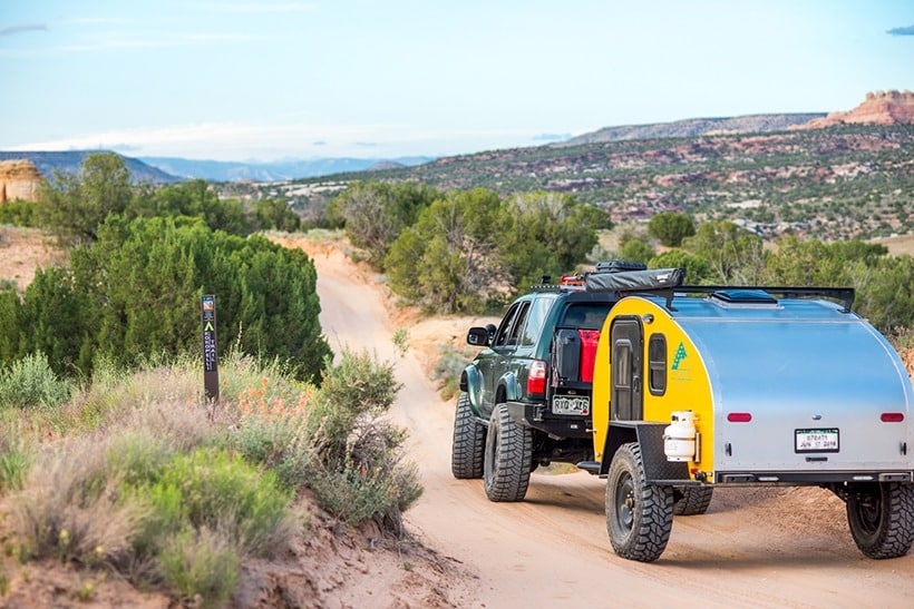 TIMBERLEAF TRAILERS, OVERLAND TRAILERS, OFFROAD TRAILERS, OVERLANDING, OVERLAND, What started as a conversation in 2015 between founder Kevin Molick and his wife, Paula, has since skyrocketed into one of the top names in the world of Teardrop Trailers. Kevin and Paula were discussing their desire to get back out to camping and traveling their back yard of Colorado and the neighboring states but wanted to get away from the cold and discomfort of tent camping. Large pull-behind RVs or motor-homes just weren’t their style and after some searching, Kevin discovered the teardrop trailer and was instantly intrigued.
The teardrop trailer seemed the perfect fit, it checked all of the boxes: light enough to pull with their Subaru Outback, the ability to park it as a base camp, comfort and warmth for sleeping, ample cooking space, and visually appealing.
Our Handcrafted trailers are exceptionally easy to tow and built with quality craftsmanship which is evident in every detail from start to finish. Teardrop Trailers are quietly taking the RV world by storm. Our custom teardrop trailers offer overlanders comfortable sleeping quarters, as well as a functional, and beautiful rear galley kitchen. We offer a multitude of custom options for our lightweight teardrop trailers, including different off-road versions of the Classic and the Pika. Available in an array of colors, from vibrant to subdued, every trailer is hand built to order in our shop in Grand Junction, Colorado.
Tel: 970-778-3744 hello@timberleaftrailers.com